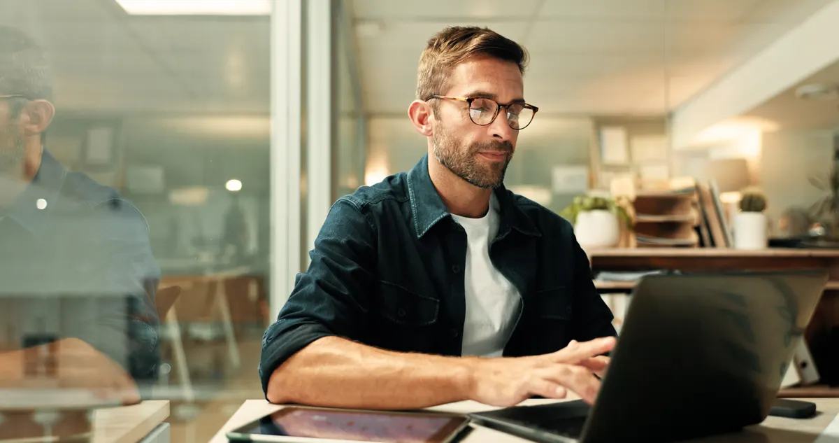 An IT professional assessing endpoint vulnerabilities and exposure on screen